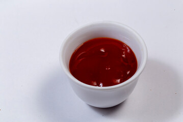 Cup of red tomato sauce