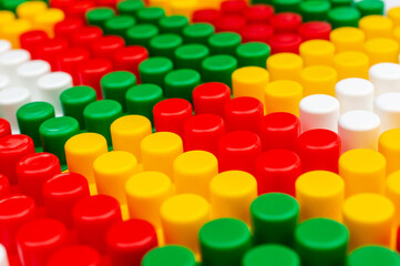 Abstract background of colorful toy blocks. Children's constructor.