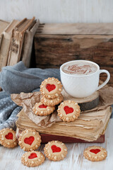 Coffee Cup and hearts cookies. Homemade Cookies with red jam Heart. romantic sweets, Valentine's day concept
