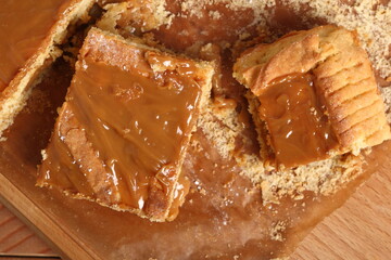 Shortcrust pastry cake covered with fudge caramel cream. Mazurek, Poland.