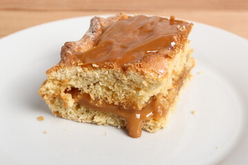 Shortcrust pastry cake covered with fudge caramel cream. Mazurek, Poland.