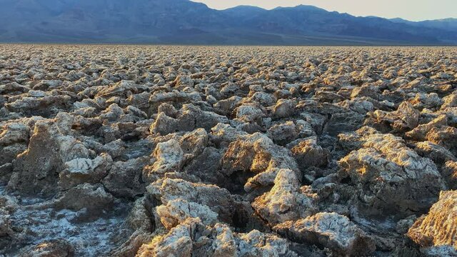 Panorama of Devils Golf Course at sunset at Death Valley National Park, CA, USA. Panorama.