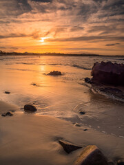 Fototapeta na wymiar Beautiful Seaside Sunset in Portrait Mode Noosa