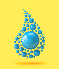 Blue spheres in the shape of a water drop isolated on yellow background