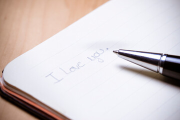 Note book with the words "i love you"
