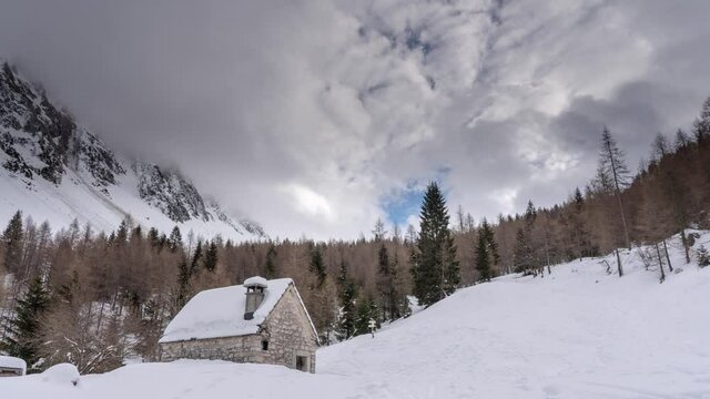 time lapse of winter passage with moving clouds