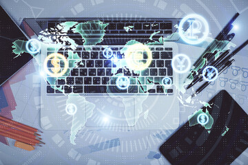 Multi exposure of forex chart drawing over table background with computer. Concept of financial research and analysis. Top view.