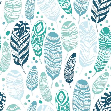 Vector seamless feathers pattern in boho style
