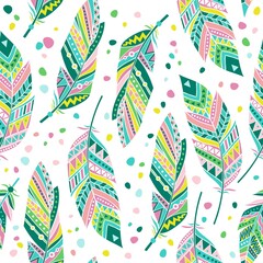 Vector seamless feathers pattern in boho style
