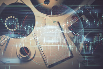 Multi exposure of forex chart drawing and work table top veiw. Concept of financial analysis.