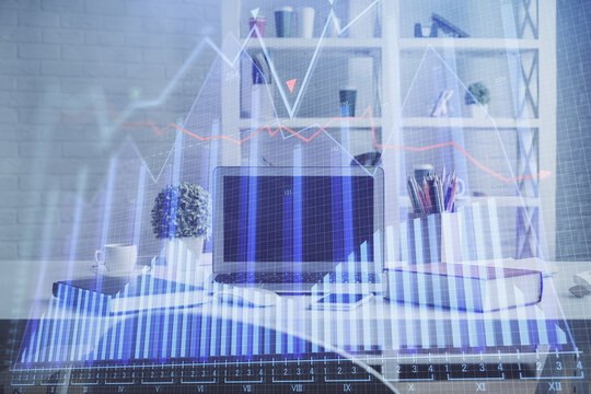Double exposure of financial graph drawing and office interior background. Concept of stock market.