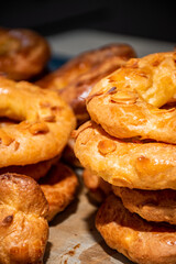 Almond doughnuts, homemade almond donuts. Homemade Spanish pastries with honey, butter and nuts.