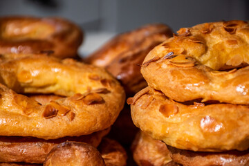 Almond doughnuts, homemade almond donuts. Homemade Spanish pastries with honey, butter and nuts.