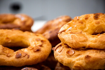 Almond doughnuts, homemade almond donuts. Homemade Spanish pastries with honey, butter and nuts.