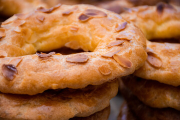 Almond doughnuts, homemade almond donuts. Homemade Spanish pastries with honey, butter and nuts.
