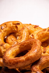 Almond doughnuts, homemade almond donuts. Homemade Spanish pastries with honey, butter and nuts.