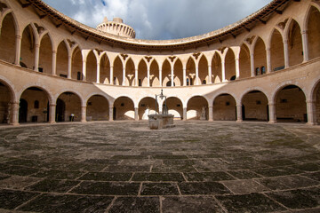 Fototapeta na wymiar Inner courtyard of Bellver castle with its arcades in Palma de Majorca, Balearic Islands, Spain
