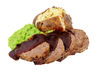 Baked beef and pork meatloaf with a jacket potato and gravy meal isolated on a white background