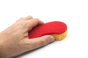 Obraz na płótnie Canvas Closeup of red ergonomic sponge in hand on white background