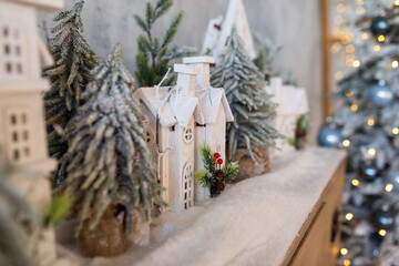 Christmas tree toy, against the background of a decorated Christmas tree, creating a New Year's mood.	