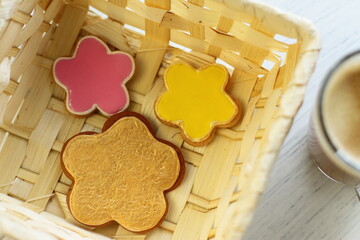 Gingerbread with coffee, ginger sweet homemade cookies in a basket with cup of hot drink, breakfast surprise for birthday Valentine's day