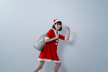 Obraz premium サンタクロースのコスプレをした女性