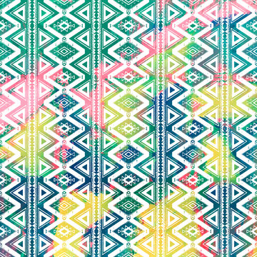 Geometric klim ikat pattern with grunge texture
