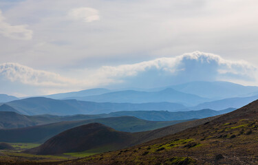 Mountains in fog going in layers into perspective