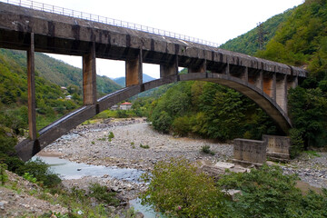 Fototapeta premium Beautiful aqueduct over the mountain river Chorokh.