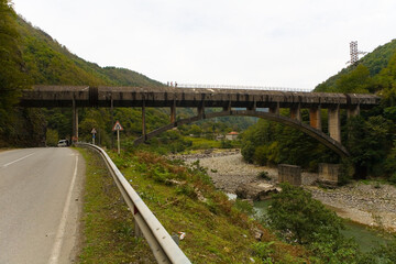 Fototapeta na wymiar Beautiful aqueduct over the mountain river Chorokh.