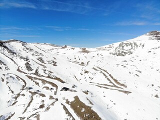 Fototapeta na wymiar Aerial view of a snowy mountain in northern Spain