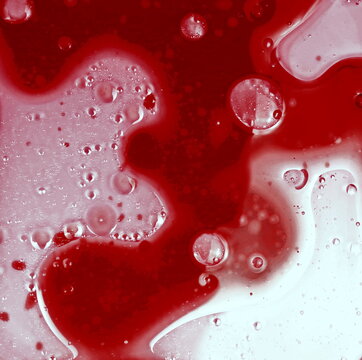 Red Oil Paint In Water Background And Texture