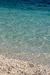 Sea waves on the pebble beach