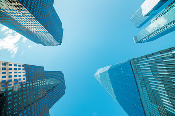 Obraz na płótnie Canvas Skyscrapers in a finance district at Manhattan. New York, USA.