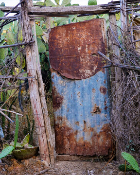 An old door to an abandoned house