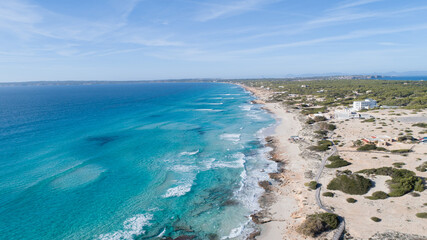 incredible beach with a turquoise sea in Formentera island seen from above