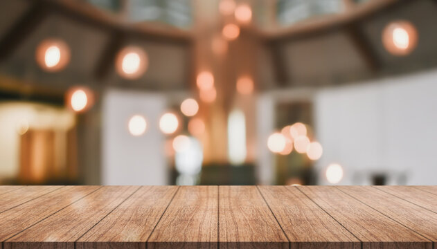 Empty wood table on blur restaurant background.	 Wooden top table background