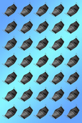 Protective mask pattern. Face protective masks pattern isolated on gradient background. Many black medical masks on the multicolored background. Medical pattern concept. Isometric