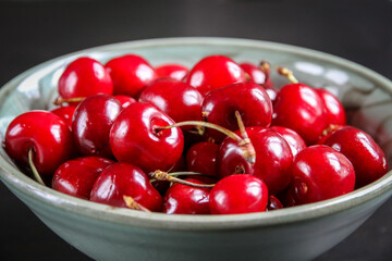 Fresh cherries in a bowl
