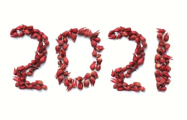 2021 Written with Roselle Fruit or Hibiscus Sabdariffa, Creative Photo of Happy New Year 2021