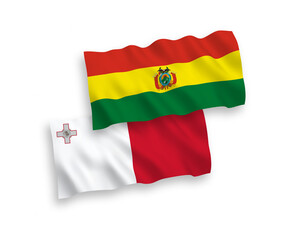 National vector fabric wave flags of Malta and Bolivia isolated on white background. 1 to 2 proportion.