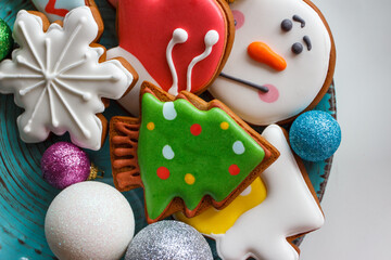 Gingerbreads with different decorations from confectionery mastic