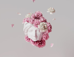 3D Ancient woman Statue, white broken stone. Greek,roman  goodness style. Head sculpture pink flowers bouquet on gray background. Nature, Peonies, falling petals. Feminine beauty  abstract 3D render. © kopikoo