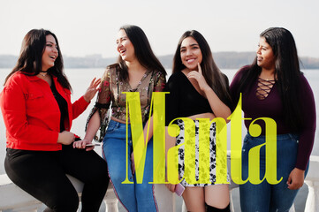 Manta city. Group of four happy and pretty latino girls from Ecuador.