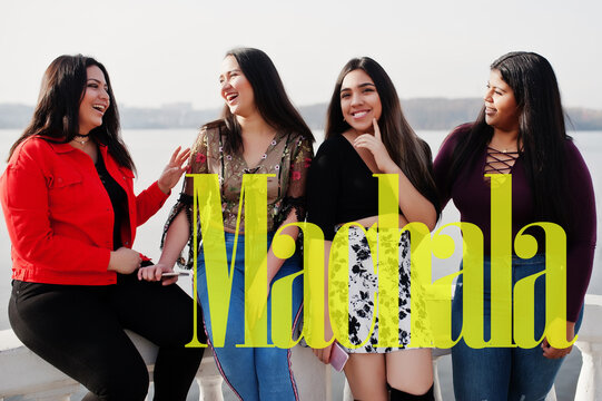 Machala city. Group of four happy and pretty latino girls from Ecuador.