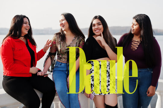 Daule city. Group of four happy and pretty latino girls from Ecuador.