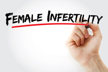 Female infertility text with marker, concept background