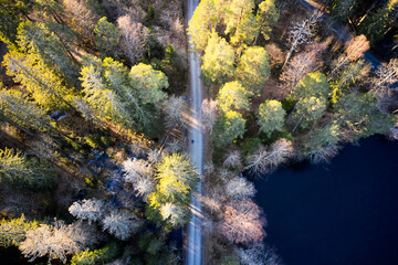 Drone photo shot from the sky. Countryside just outside of Oslo, Norway. Fields and wood mixed together. 