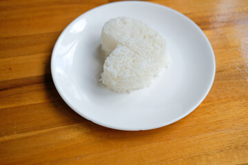 heart shaped steamed rice in white plate