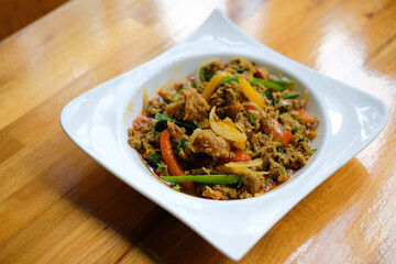 soft shell crab stir fried with curry powder paste, bell pepper, onion